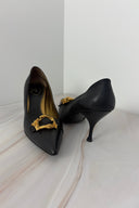 Prada Noir Gold Emblem Pumps