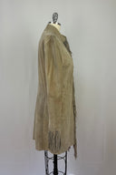 Please Trend soft dove grey suede with dramatic fringing