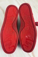 Louboutin red spike sneaker