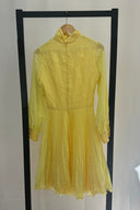 1960s Butter yellow roll neck dress with pleated skirt
